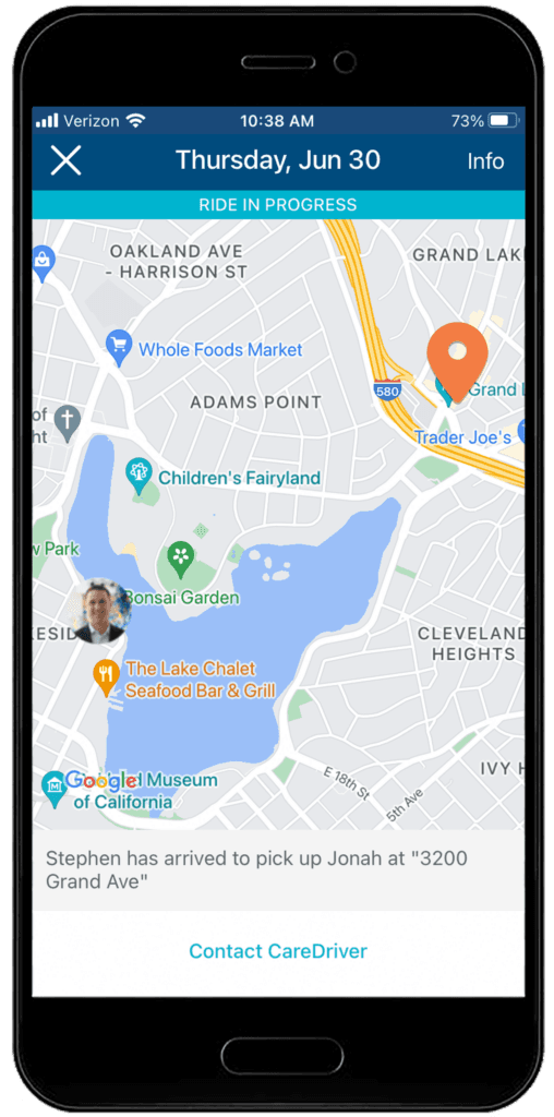 Mobile app screen showing a map of Oakland's Adams Point area with ride pickup location and various landmarks like Whole Foods and Lake Merritt