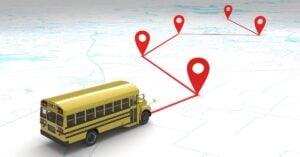 Yellow school bus with red GPS location pins marking a route path on a light gray background