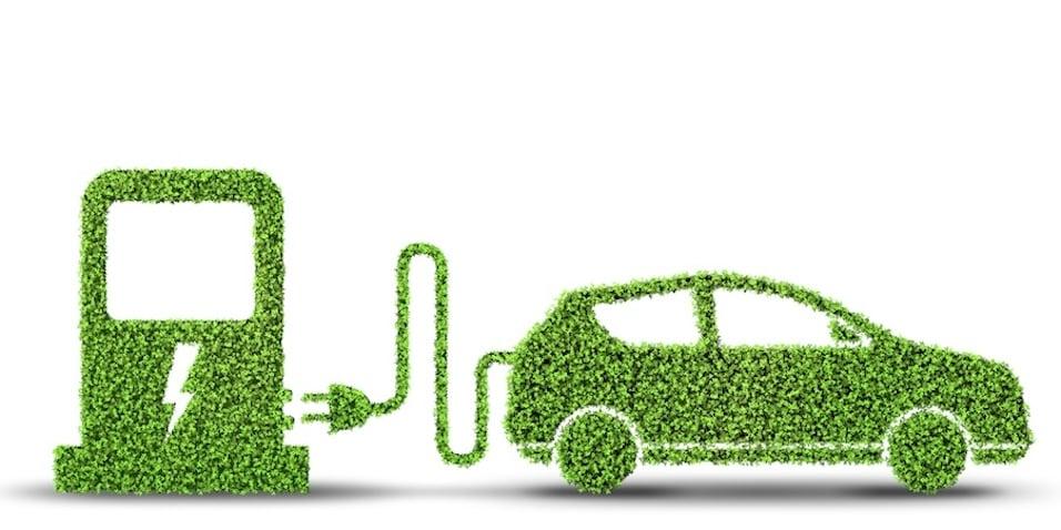 Environmentally friendly electric vehicle charging station icon made of green leaves or grass texture